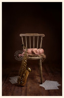 Newborn with Saxophone